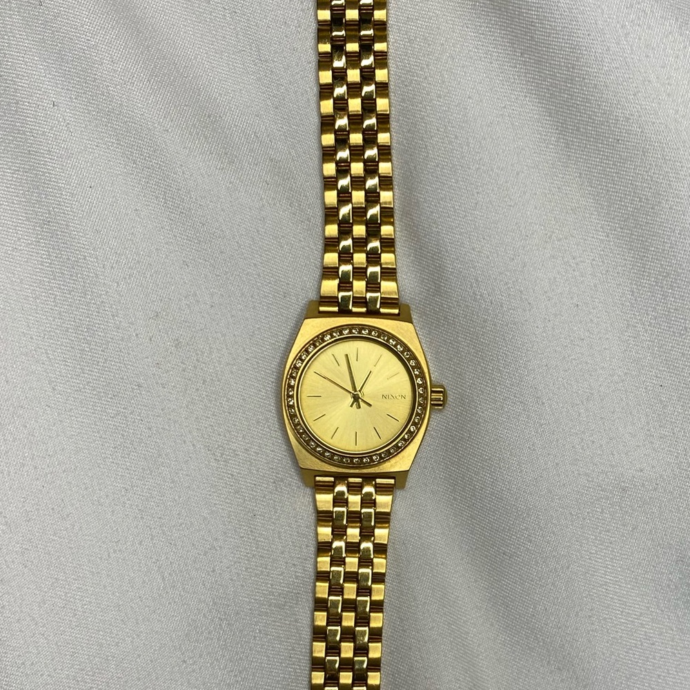 Gold Nixon watch